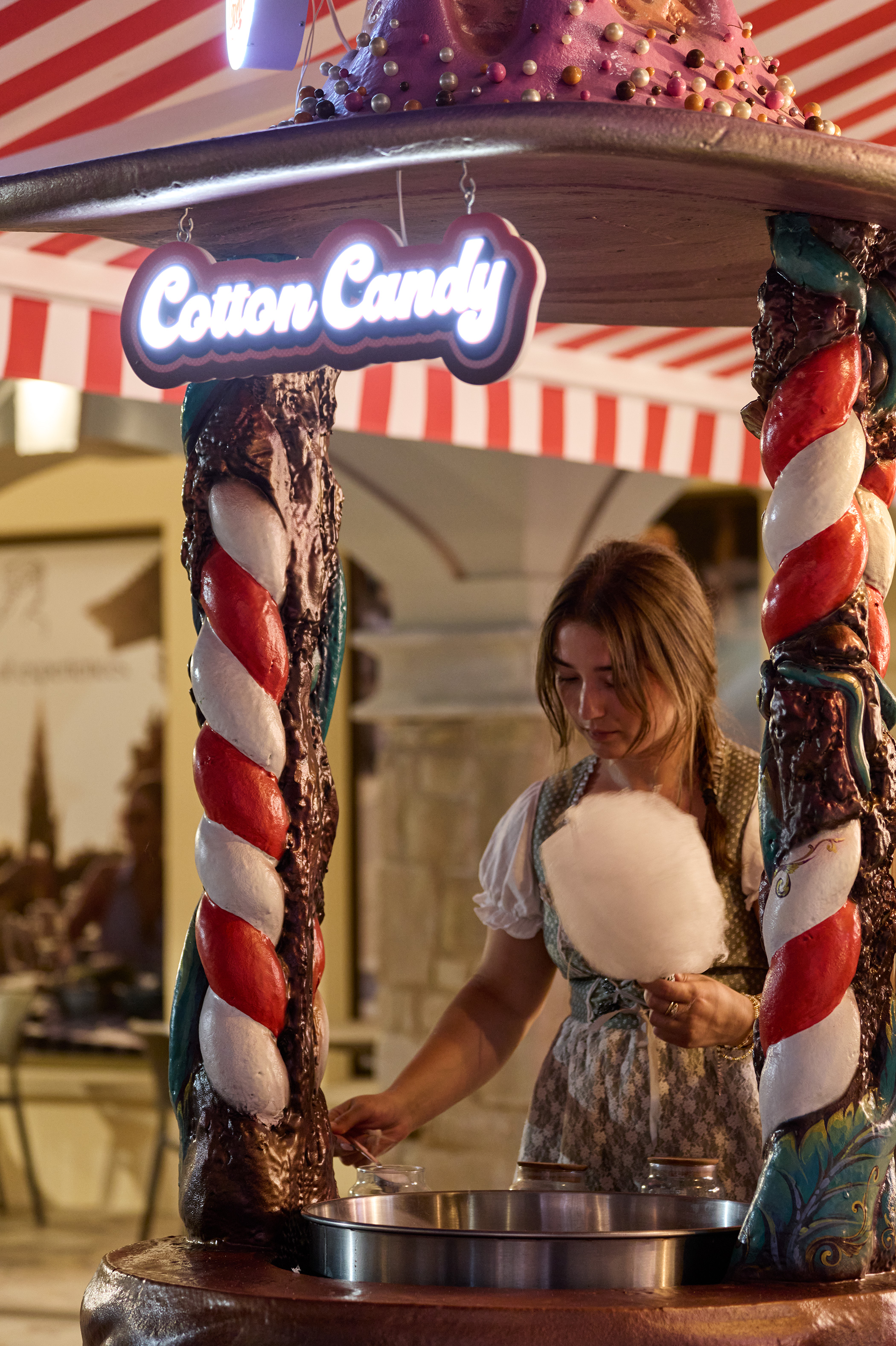 Girl serving Cotton Candy at Hans and Gretel